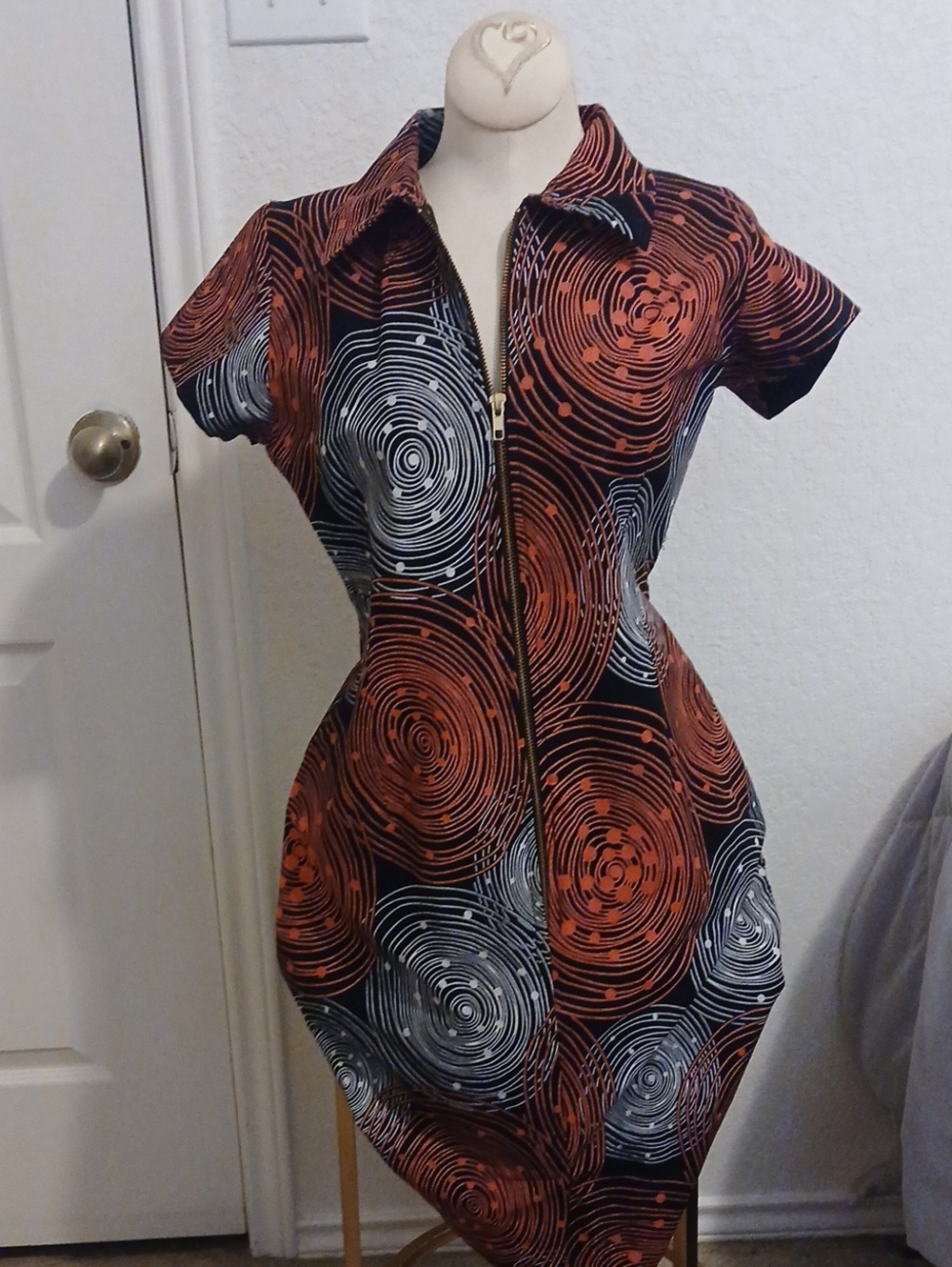 Zip-Front Black Mini Dress with Rust and Silver Swirl Print